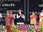 The Ayushman Bharat Health Infrastructure Mission will strengthen the health infrastructure of Uttar Pradesh as well as of the country, help in preparations to face future pandemics and bring confidence and self-reliance in the health sector, PM Modi said. Uttar Pradesh Governor Anandiben Patel, Union Minister for Health and Family Welfare, Chemicals and Fertilizers Mansukh Mandaviya, Chief Minister Yogi Adityanath, and other dignitaries are also seen in this photo.(ANI)