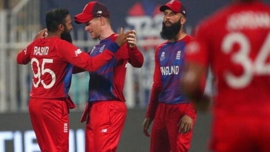 England's Adil Rashid, without cap, celebrates the dismissal of Sri Lanka's Kusal Perera during the Cricket Twenty20 World Cup match between England and Sri Lanka in Sharjah, UAE, Monday, Nov. 1, 2021.&nbsp;(AP)