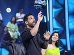 John Abraham showed some tricks with a football as Divya Khosla Kumar looked on in awe.