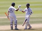 Cricket - Second Test - South Africa v India - Imperial Wanderers Stadium, Johannesburg, South Africa - January 5, 2022 India's Ajinkya Rahane celebrates his half century with Cheteshwar Pujara REUTERS/Rogan Ward(REUTERS)