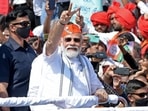 Prime Minister Narendra Modi held a roadshow here on Friday, just a day after the Bharatiya Janata Party (BJP) won in four out of five states including Uttar Pradesh, Uttarakhand, Manipur and Goa in recently concluded assembly polls.(AFP)