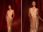 Mouni Roy goes all out and wears a pearl sleeveless top paired with a pleated saree inspired skirt for one of the episodes of the show DID L'il Masters Season 5 where she will be seen as a host.(Instagram/@imouniroy)