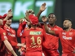 Kagiso Rabada of Punjab Kings celebrates with teammates, after taking the wicket of Wriddhiman Saha of Gujarat Titans(PTI)