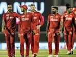 Punjab Kings players after their win in the Indian Premier League 2022 cricket match against Royal Challengers Bangalore at the Brabourne Stadium(PTI)