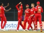 Mumbai: Punjab Kings players celebrate the wicket of Priyam Garg of the Sunrisers Hyderabad during T20 cricket match 70 of the Indian Premier League 2022 (IPL season 15) between the Sunrisers Hyderabad and the Punjab Kings, at the Wankhede Stadium in Mumbai, Sunday, May 22, 2022. (Sportzpics for IPL/PTI Photo)(PTI05_22_2022_000157A)(PTI)