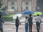 Visitors at Humayun's Tomb during a brief spell of Rains in New Delhi, on July 3, 2022. (Sanchit Khanna/HT Photo)