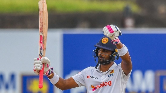 Dinesh Chandimal celebrates after scoring a half-century during Day 3 of the 1st Test between Sri Lanka and Pakistan(AFP)