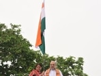 Union home minister Amit Shah hoisted the national flag at his residence in New Delhi on Saturday, on the occasion of Har Ghar Tiranga campaign. He shared the picture on Twitter, writing, “Tiranga is our pride”. (Twitter/Amit Shah)