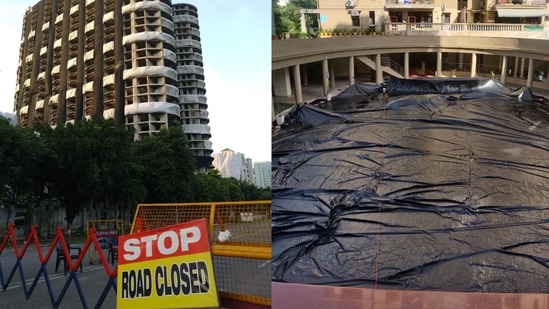 Ahead of demolition of Noida Supertech twin towers today, nearby society Silvercity has wrapped up its swimming pool to prevent it from getting polluted from the dust that will follow the demolition of the tallest building in the country to be razed in a controlled explosion.(Sunil Ghosh / Hindustan Times)