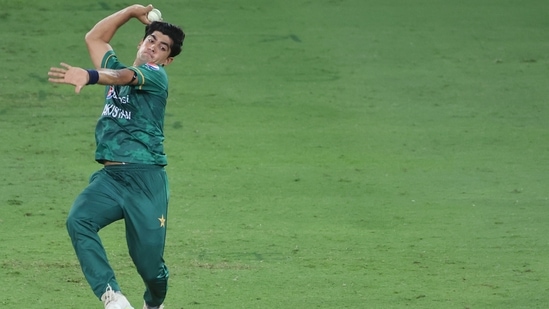 Pakistan pacer Naseem Shah delivers a ball during the Asia Cup(AFP)