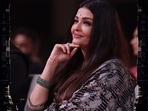 Aishwarya Rai attended the trailer launch event of Ponniyin Selvan in Chennai on Tuesday evening. The actor was dressed in black ethnic wear. Aishwarya greeted director Mani Ratnam with a hug and he patted her back. Aishwarya also touched Rajinikanth's feet before he pulled her up and gave her a hug. In the film, Aishwarya will be seen in dual roles --one of queen Nandini, the princess of Pazhuvoor, and the other of Mandakini Devi.