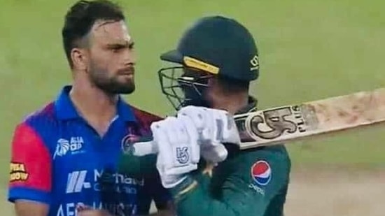 Snapshot of the almost physical tussle between Pakistan batsman Asif Ali and Afghanistan bowler Fareed Ahmad. during the match between the two teams on Wednesday.(twitter\ Gulbadin Naib)