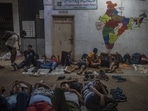 Candidates for recruitment under the Agnipath Scheme are seen resting at a school in Thane near Mumbai. The young men are billeted on the ground floor of a municipal school campus but there’s not enough space for all of them, so many of them have colonized the under-construction road outside where they sleep without any sheets. (Satish Bate / HT Photo)