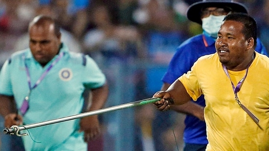 Ground staff comes rushing as a snake is found on field during the 2nd T20I match between India and South Africa at Barsapara Cricket Stadium, in Guwahati.(ANI)