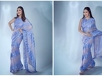 Madhuri Dixit is the ultimate 'dhak dhak' girl and her stylish appearances on shows and events speak volumes. For Manish Malhotra's Diwali bash, the timeless beauty draped a blue sequin 9-yards from the collection the designer's collection.(Instagram/@madhuridixtnene)