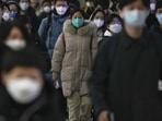 Masked commuters at a subway station during the morning rush hour in Beijing, on December 20. In wake of the Chinese government’s decision to lift the Covid curbs, cases have seen an upward rise across the country, AFP reported.(Andy Wong / AP)