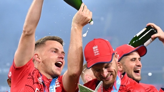 Sam Curran celebrates after England won the T20 World Cup in Australia(AFP)