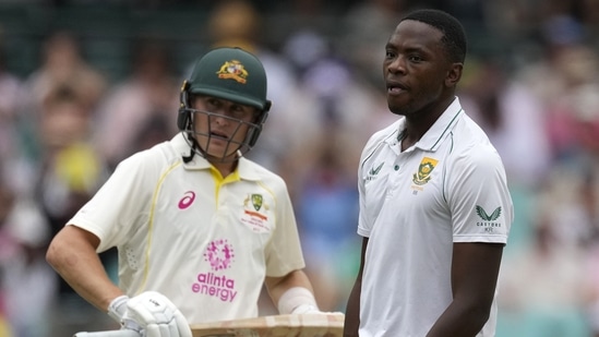 South Africa's Kagiso Rabada, right, turns away after Australia's Marnus Labuschagne, left, hits a boundary during the first day of their cricket test match at the Sydney Cricket Ground in Sydney, Wednesday, Jan. 4, 2023. (AP)