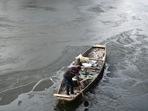 Jammu and Kashmir's iconic Dal Lake freezes as temperature dips.(Waseem Andrabi /Hindustan Times)