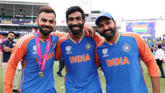 India's captain Rohit Sharma, Virat Kohli and Jasprit Bumrah pose for a group picture after Team India wins the ICC Mens T20 World Cup 2024 final match against South Africa(BCCI-X)