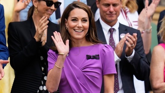 Kate was wearing a purple dress — one of Wimbledon's official colours.&nbsp;(AP)