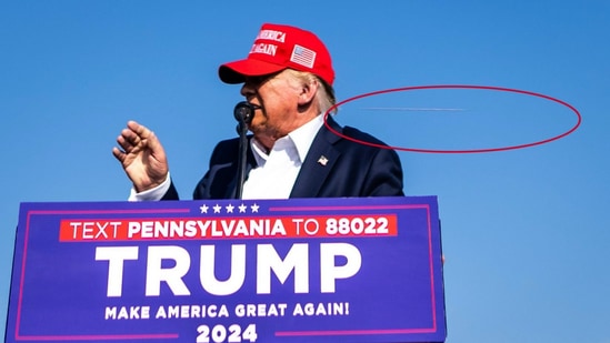 Photo by New York Times photographer Doug Mills shows a bullet flying just behind Trump's head.(New York Times)