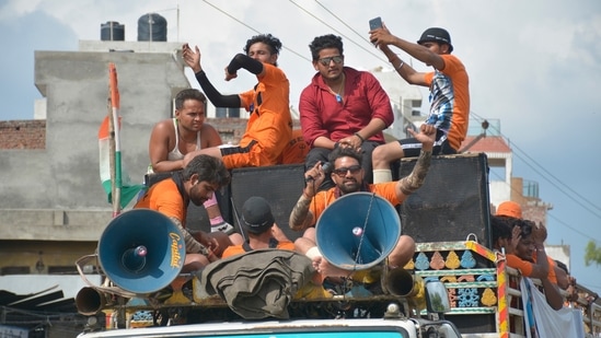 Kanwariyas arriving from Haridwar during the Kanwar Yatra, at NH 58 Meerut road, in Ghaziabad, India, onJuly 29, 2019. (HT File)