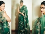 Rashmika Mandanna’s recent look in a saree defines sartorial elegance. The Animal actor is a total stunner who effortlessly sets fashion goals, whether in a red-carpet-worthy gown or a sharp pantsuit. Recently, she embraced her ethnic side in a green saree that exudes unmatched glamour. Let’s decode her chic appearance and take some fashion notes from this diva.(Instagram/@rashmika_mandanna)