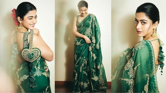 Rashmika Mandanna’s recent look in a saree defines sartorial elegance. The Animal actor is a total stunner who effortlessly sets fashion goals, whether in a red-carpet-worthy gown or a sharp pantsuit. Recently, she embraced her ethnic side in a green saree that exudes unmatched glamour. Let’s decode her chic appearance and take some fashion notes from this diva.(Instagram/@rashmika_mandanna)