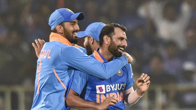 Virat Kohli celebrates with pacers Md Shami and Shardul Thakur after their win in the 2nd ODI against West Indies at ACA-VDCA Cricket Stadium in Visakhapatnam, (PTI)