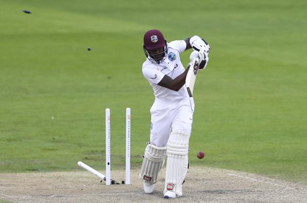 West Indies' Jermaine Blackwood is bowled out by England's Chris Woakes during the second day of the third cricket Test match between England and West Indies at Old Trafford in Manchester, England, Saturday, July 25, 2020. (Michael Steele/Pool via AP) (AP)