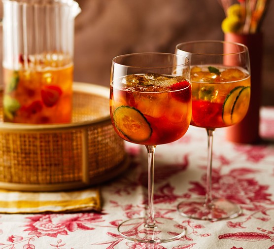 Pimm's in glasses with fruit and cucumber