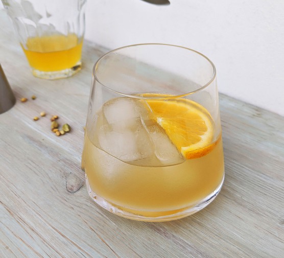 Negroni mocktail in a glass with orange and ice