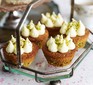 Little pistachio cakes with icing on stand