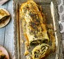 Cavolo nero, mushroom, potato & fontina strudel with a slice cut out