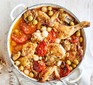 Chicken thigh casserole with beans in a pot