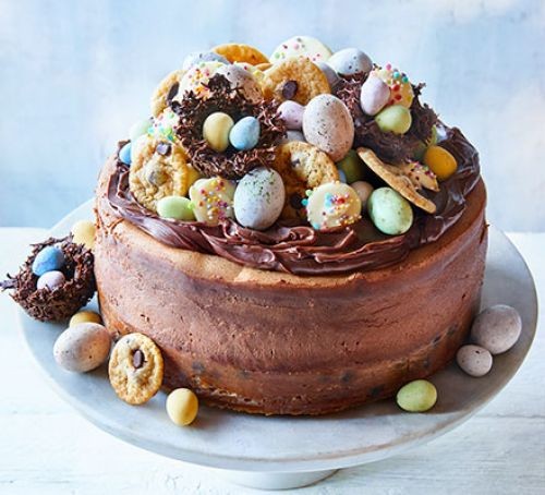 Chocolate cheesecake with cookie dough base and Easter egg topping