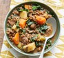 Lentil and veg one-pot in bowl with spoon