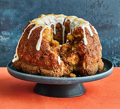 Monkey bread with icing on stand