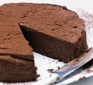 Chocolate torte with slice cut