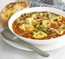 Pasta with vegetable soup in bowl