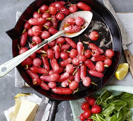 Brown butter basted radishes in a skillet