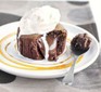 Chocolate pudding with ice cream on plate