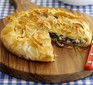 Crispy Greek-style pie filled with feta, spinach and sundried tomato