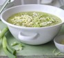 Courgette soup in bowl with cheese