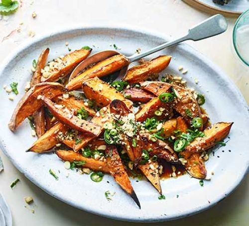 Sliced barbecued sweet potatoes on a plate