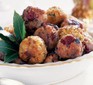 Chestnut, bacon & cranberry stuffing balls served in a bowl