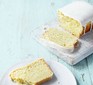 A vegan lemon cake loaf cut into slices