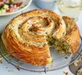 Veggie spiral pie with spiced tomato sauce & chopped salad