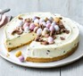 Easter egg cheesecake with the first slice cut out